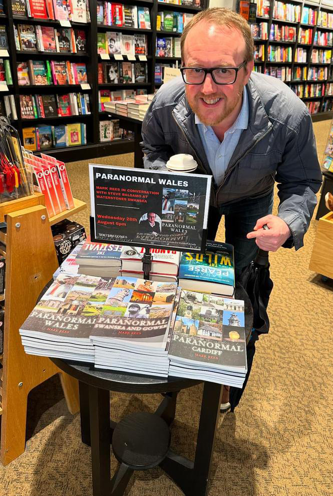 Mark Rees with the Paranormal Wales series in Waterstones Swansea.