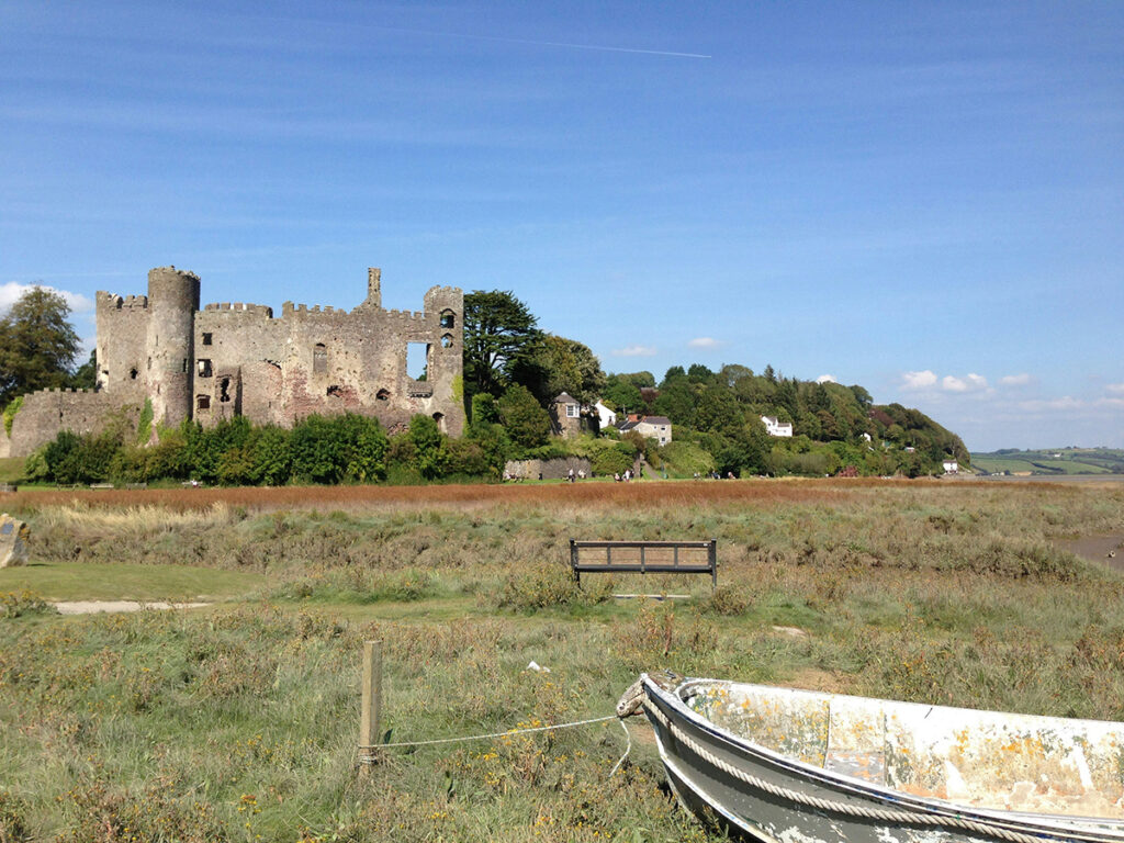 Laugharne, Wales. Photo by Stuart Smith (Unsplash).