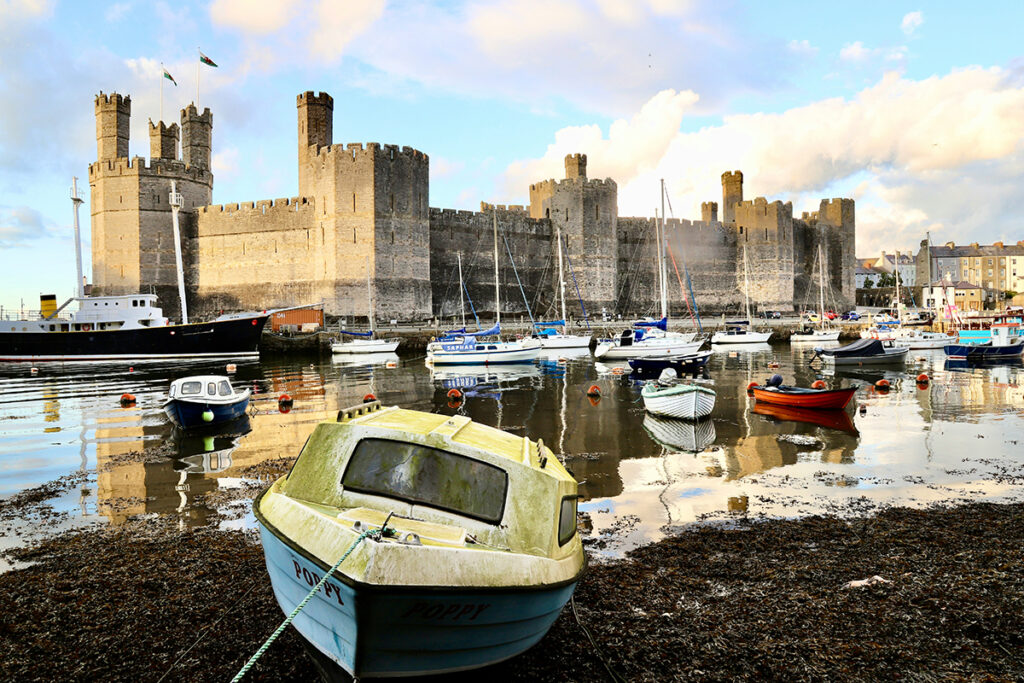 Caernarfon Castle, Wales. Photo by Tony Williams (Unsplash).