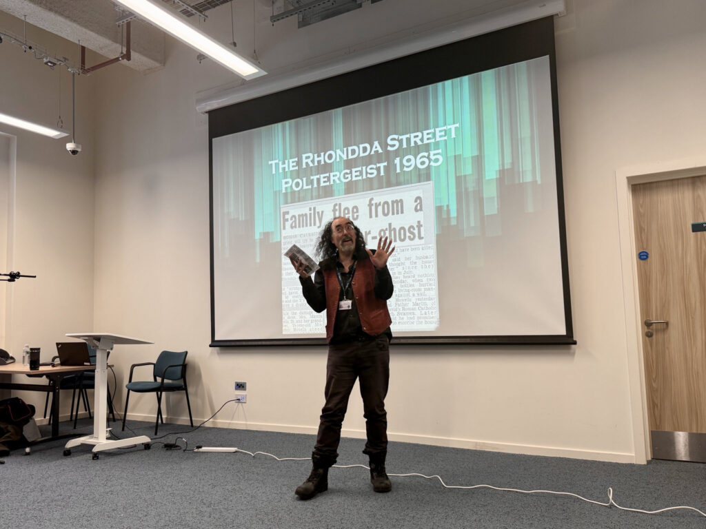 Gwilym Games at Paranormal Unpacked Live! - the Rhondda Street Poltergeist in Y Storfa, Swansea. Photo by Caroline Berry.