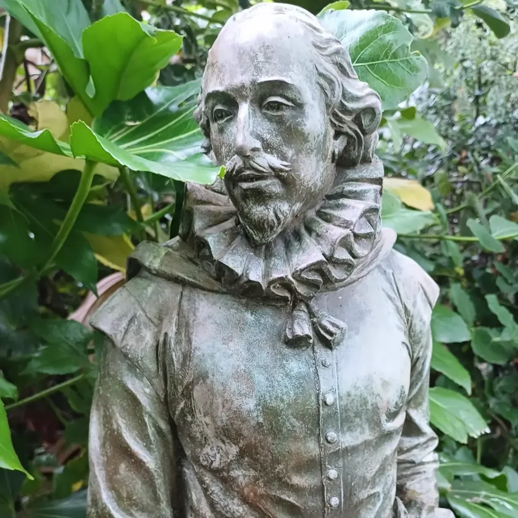 Shakespeare lurking in the foliage at Shakespeare's Birthplace.